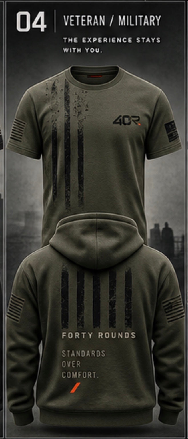 Portrait concept image showing olive flag tee and hoodie artwork with Standards Over Comfort lettering.